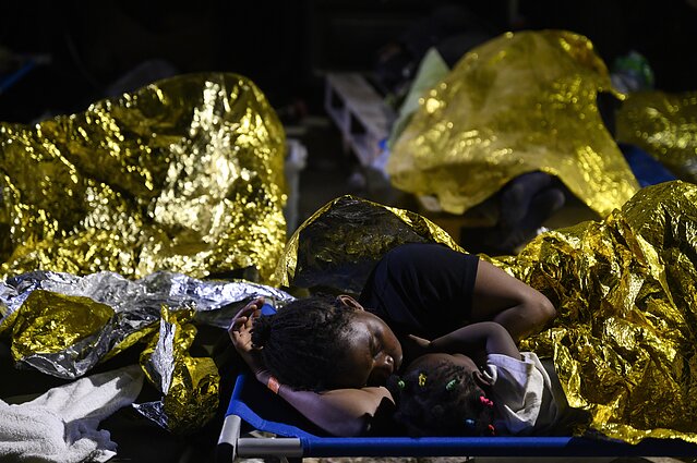 Migrantai Lampedūzoje