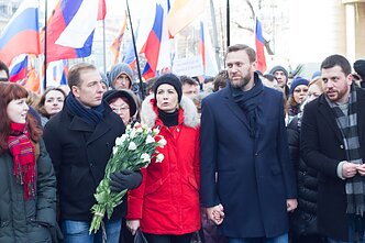 Leonid Volkov, right, with Yulia Navalnaya and Alexei Navalny, the founder of the Anti-Corruption Foundation
