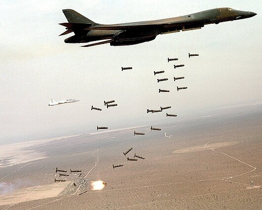 A B1B Lancer drops cluster munitions