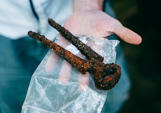 Archaeologists unearth intact partisan bunker in western Lithuania