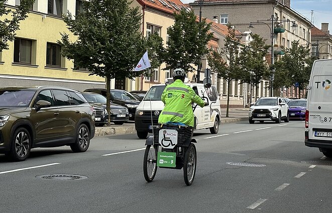Photos from Markevičius' previous record show him embarked on a challenge to cycle around Lithuania on an electric tricycle. Photos from Markevičius' previous record show him embarked on a challenge to cycle around Lithuania on an electric tricycle.