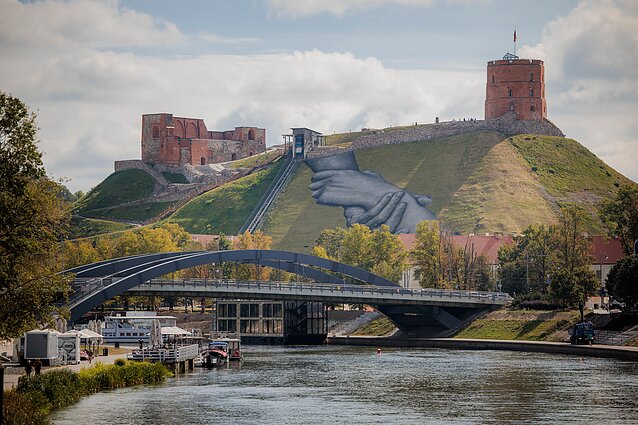 the French artist Saype presented his mural Beyond Walls on the slope of Gediminas Hill