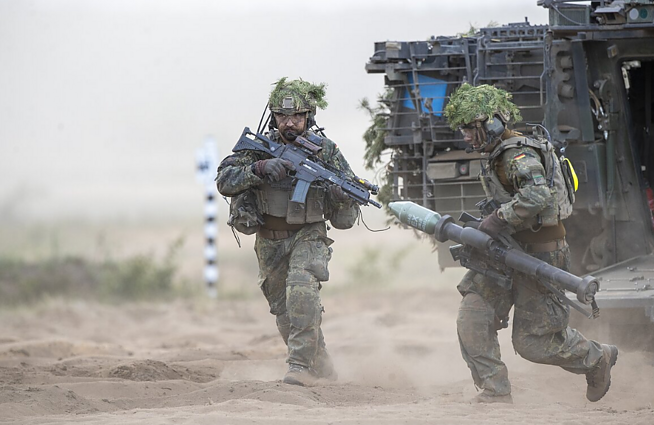 Lietuva ir Vokietija sutarė dėl brigados karių, civilių ir jų šeimų teisių
