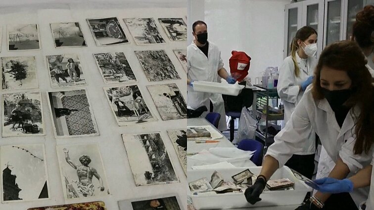 Purvini ir yrantys albumai: ekspertai bando atkurti Valensijoj liūčių pažeistas nuotraukas