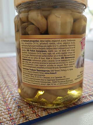 Маринованные шампиньоны с информацией на русском языке