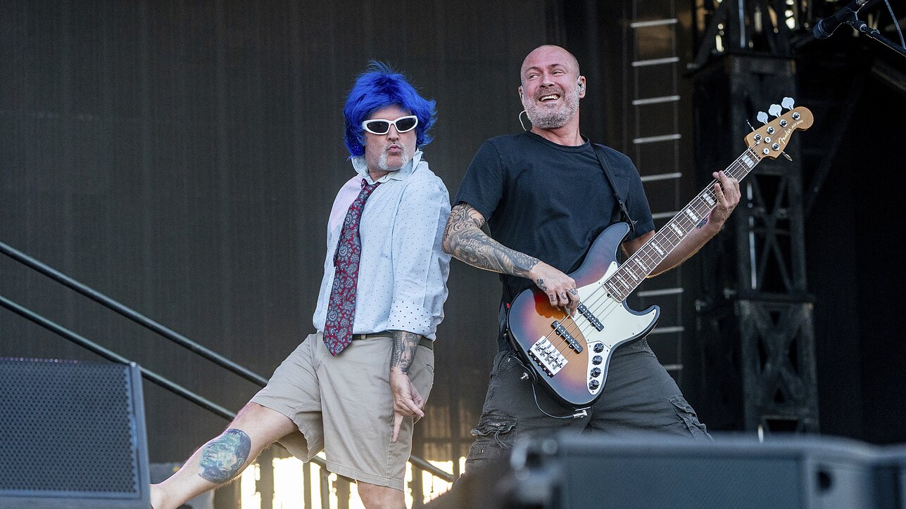 „Limp Bizkit“ vokalistas Fredas Durstas (kairėje) ir bosistas Samas Riversas