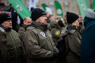 Several hundred law enforcement officers rallied outside the Lithuanian parliament Several hundred law enforcement officers rallied outside the Lithuanian parliament