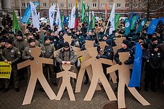 Several hundred law enforcement officers rallied outside the Lithuanian parliament Several hundred law enforcement officers rallied outside the Lithuanian parliament