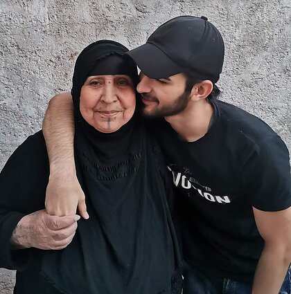 Kadim Mazin with his grandmother