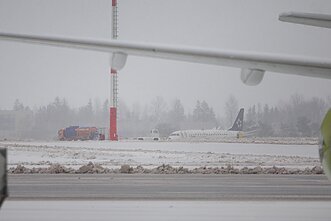 A LOT Polish Airlines aircraft arriving from Warsaw slid off the taxiway after landing at Vilnius Airport