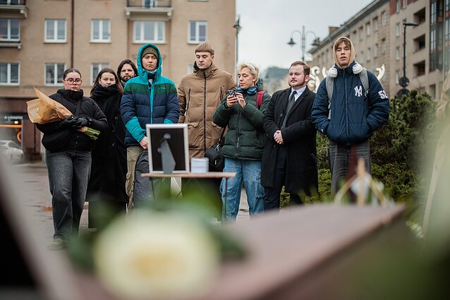 Several dozen young people gathered outside the Seimas on Friday morning in a symbolic funeral protest