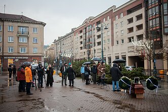 Several dozen young people gathered outside the Seimas on Friday morning in a symbolic funeral protest