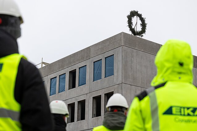 A wreath was raised Wednesday atop the future headquarters building of the German brigade at the Rūdninkai military town
