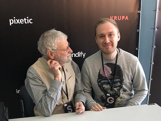 Donas Normanas ir Igoris Gubaidulinas 2019 m. konferencijoje KRUPA Kyjive