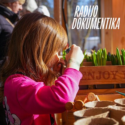 Mergaitė Bučos klasėje.