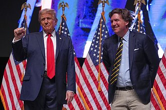 Donaldas Trumpas ir Tuckeris Carlsonas