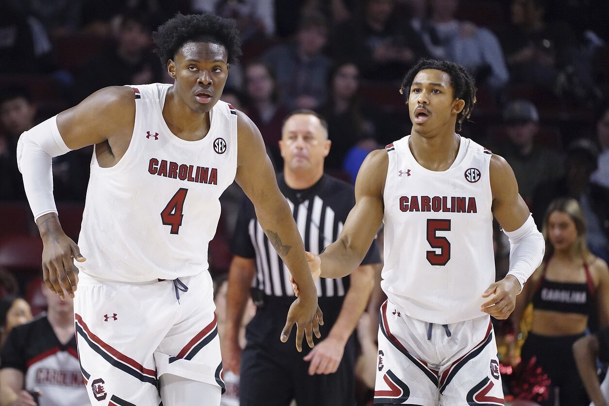 Tre-Vaughnas Minottas (kairėje)