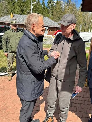 Andrzej Poczobut i Donald Tusk