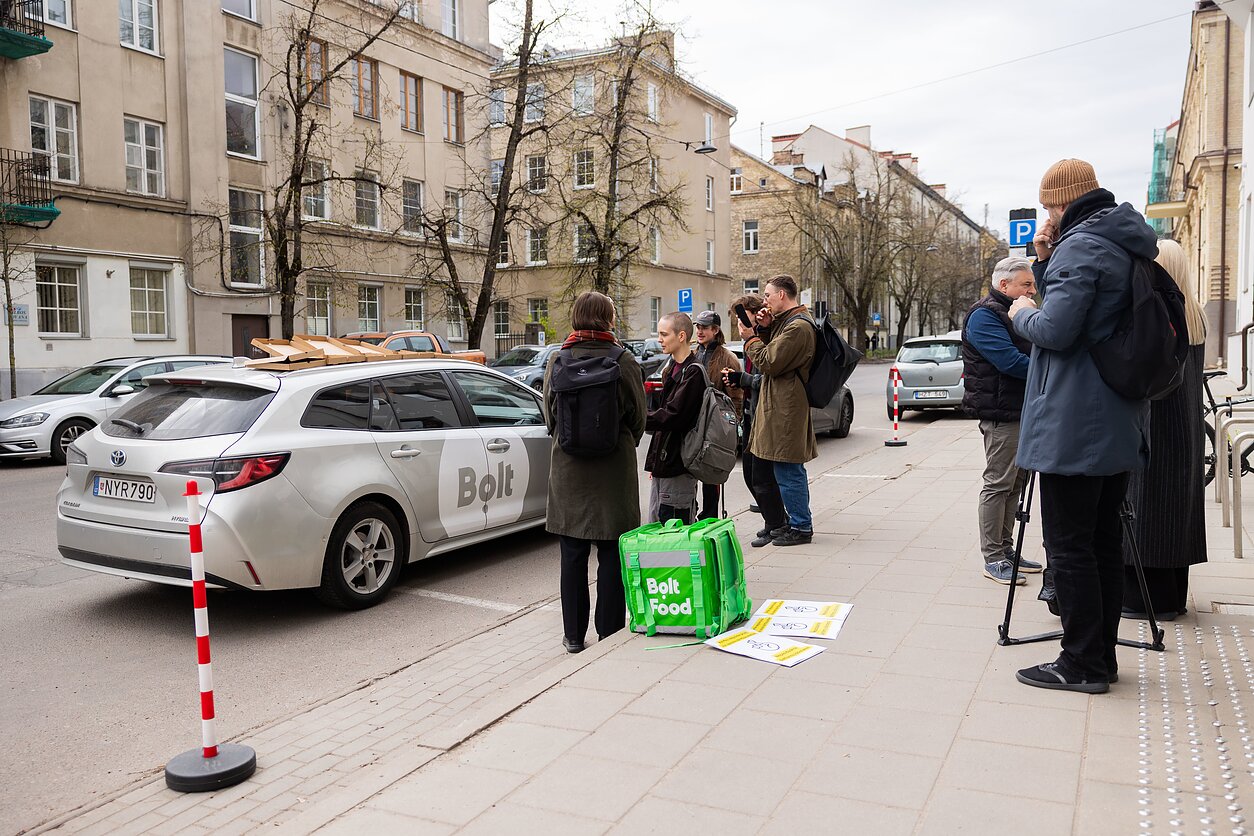 Ride-hailing drivers and couriers staged a small protest