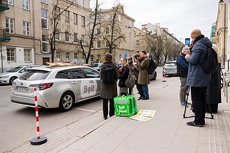 Ride-hailing drivers and couriers staged a small protest