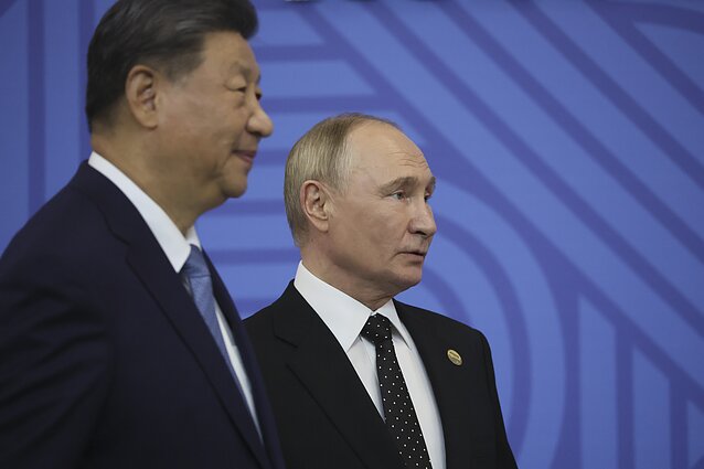 Xi Jinpingas ir Vladimiras Putinas Xi Jinpingas ir Vladimiras Putinas