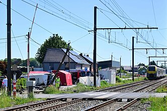 Belgijoje traukinys rėžėsi į mokyklinį autobusą Belgijoje traukinys rėžėsi į mokyklinį autobusą