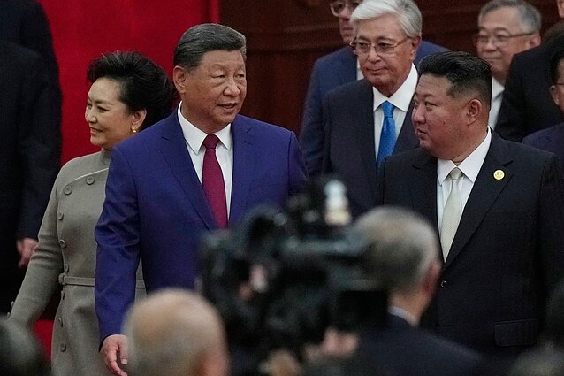 Xi Jinpingas ir Kim Jong Unas Xi Jinpingas ir Kim Jong Unas