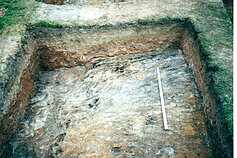 The archaeological layer of soil/deposits dating from the 13th century The archaeological layer of soil/deposits dating from the 13th century