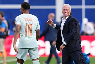 Kylianas Mbappe ir Didier Deschamps`as