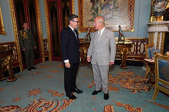 Andy Burnhamas ir Karolis III 