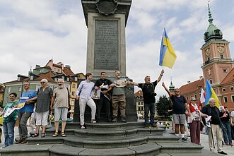 Protestuojant prieš didėjančią įtampą visoje Lenkijoje vyko solidarumo su Ukraina mitingai
