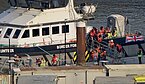 Lamanše užsidegus valčiai išgelbėta beveik 160 migrantų