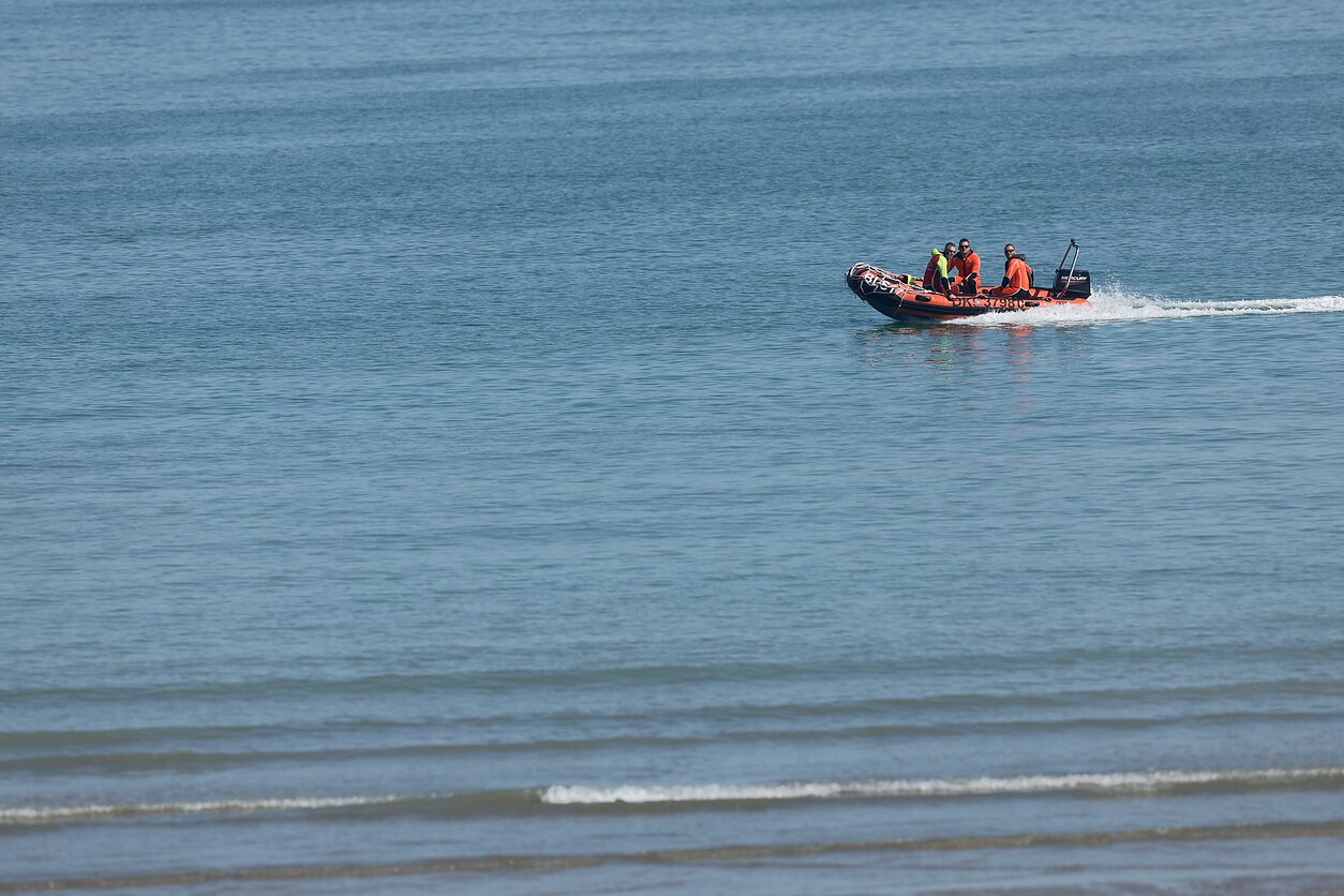 French police slash migrant boat after clash on Channel beach